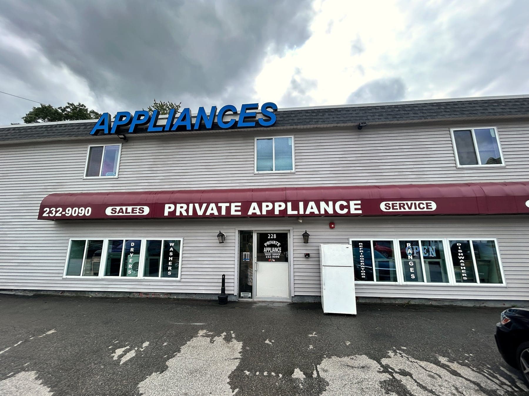 Wide view of the Private Appliance building and parking lot